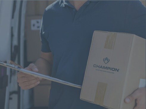 Person holding a Champion branded box